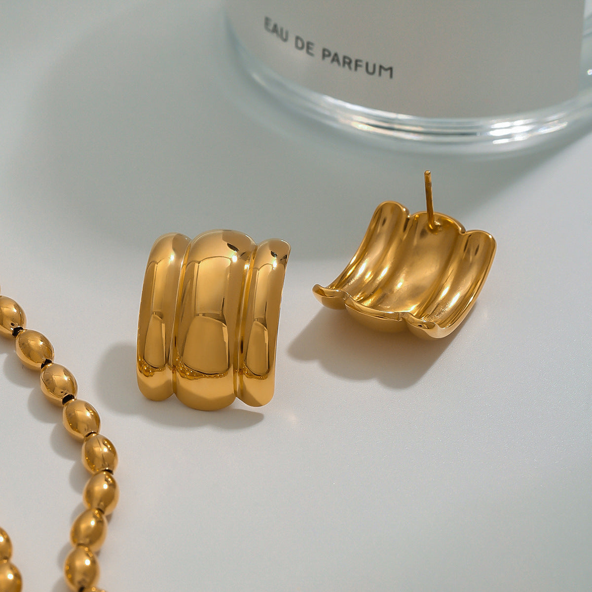 Angela Gold Arch Earrings